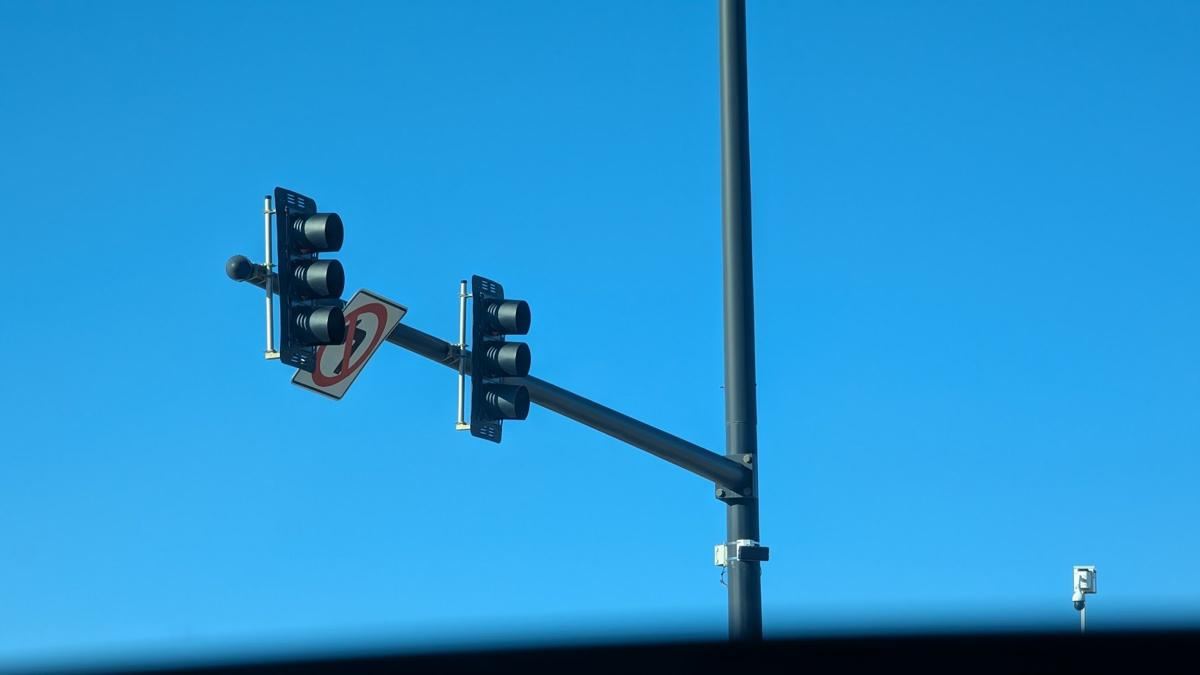 Traffic signal mast arm with a small sensor