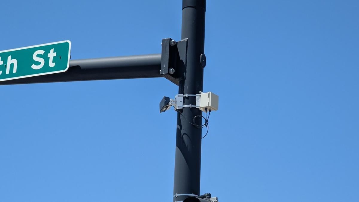 Small sensor on a traffic signal pole