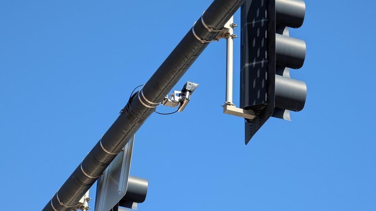 Detection camera next to traffic signal heads