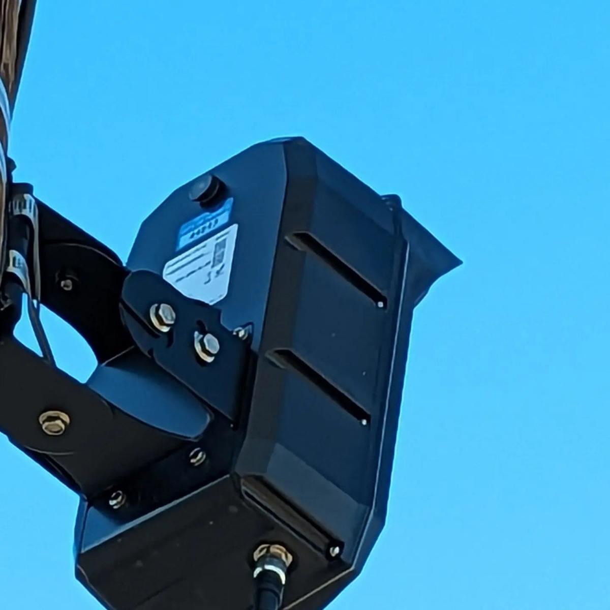 Underside of a black plate-reader camera