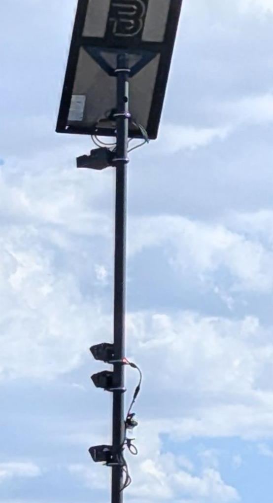 Solar pole with multiple camera heads