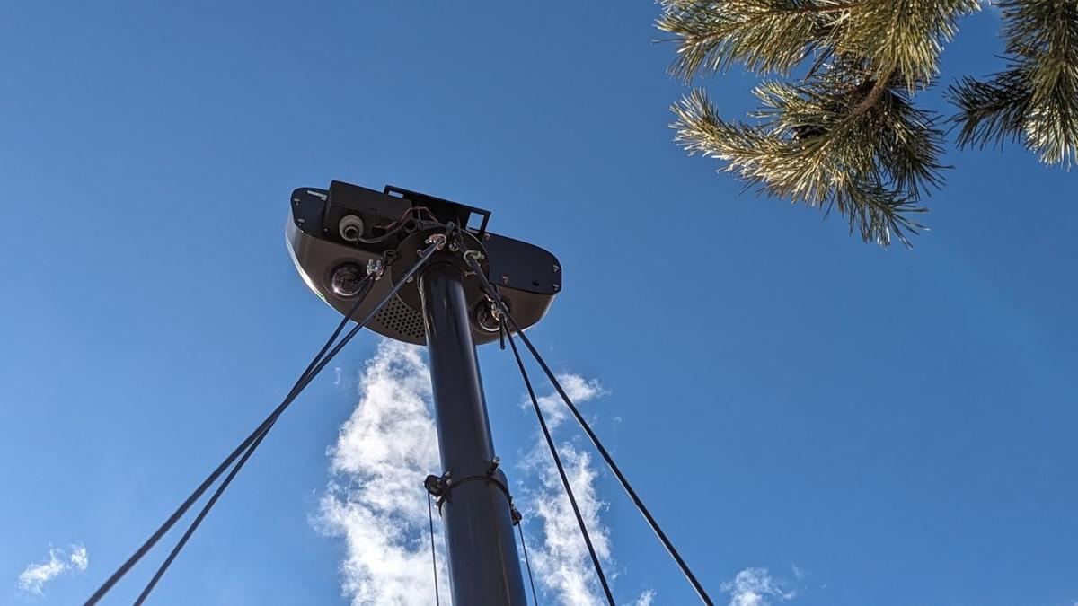 Multi-lens camera head on a guyed mast